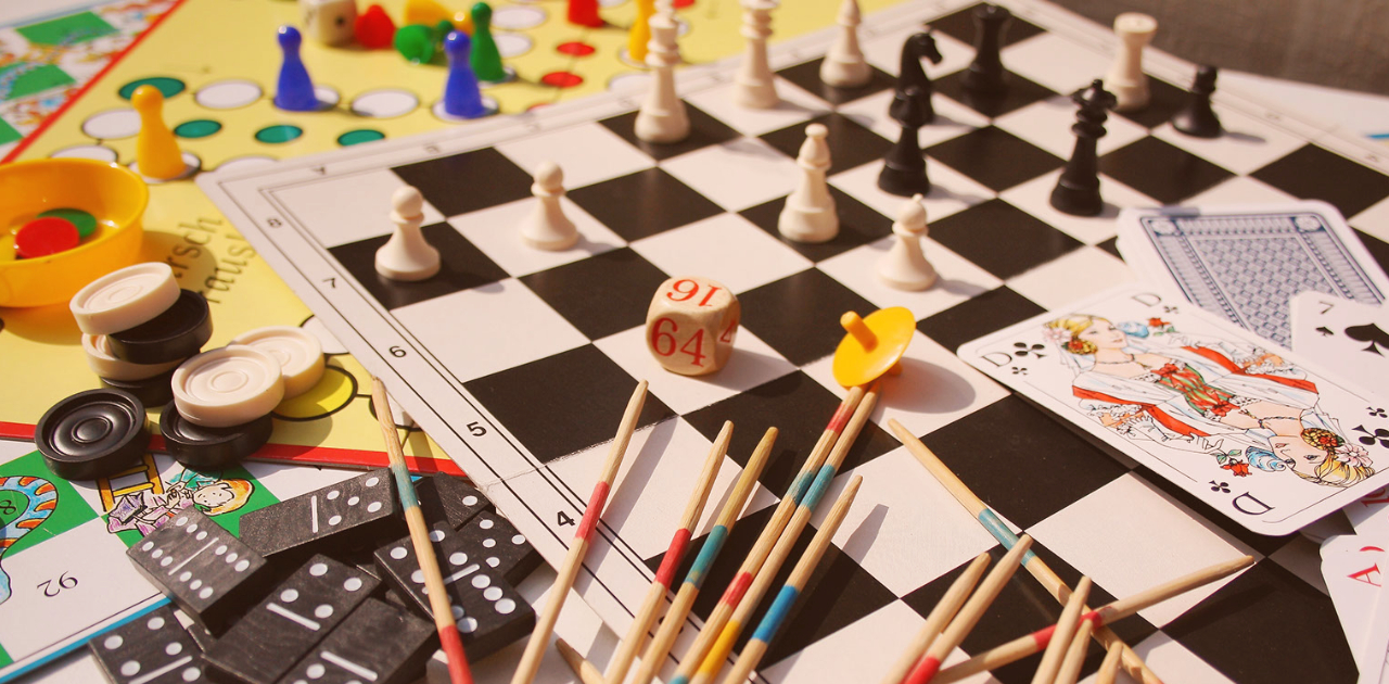 Vintage gaming pieces scattered on a table.